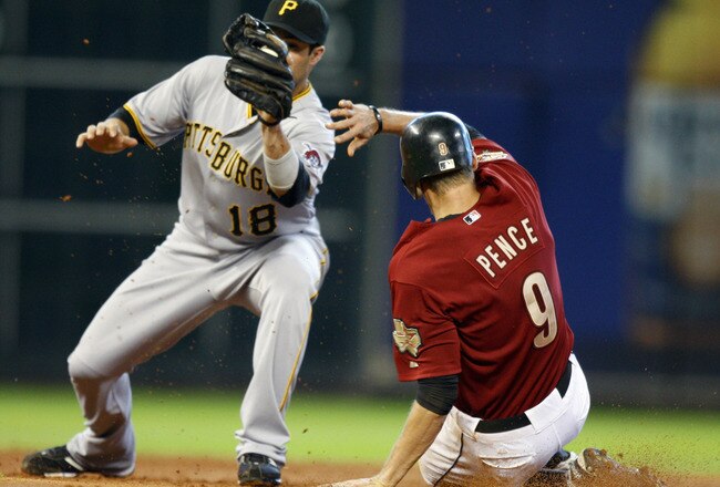 HOUSTON - AUGUST 15:  Hunter Pence #9 of the Houston Astros steals second base in the third inning as second baseman Neil Walker #18 of the Pittsburgh Pirates waits for the throw at Minute Maid Park on August 15, 2010 in Houston, Texas.  (Photo by Bob Levey/Getty Images)