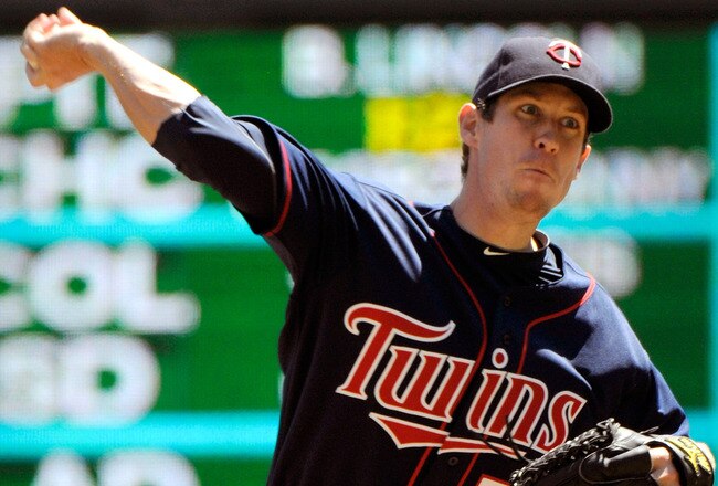 MINNEAPOLIS, MN - JUNE 30:  Kevin Slowey #59 of the Minnesota Twins pitches in the second inning against the Detroit Tigers during their game on June 30, 2010 at Target Field in Minneapolis, Minnesota. (Photo by Hannah Foslien/Getty Images)
