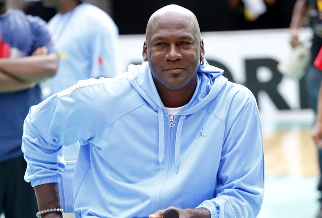 NEW YORK CITY, NY - AUGUST 13: Michael Jordan speaks during the World Basketball Festival at Rucker Park on August 13, 2010 in New York City.  (Photo by Chris Trotman/Getty Images for Nike)