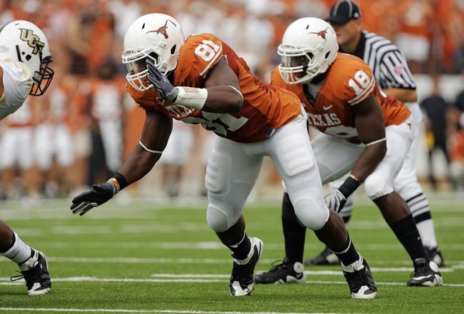 AUSTIN, TX - NOVEMBER 07:  Defensive end Sam Acho #81 and linebacker Emmanuel Acho #18 of the Texas Longhorns defend against the UCF Knights on November 7, 2009 at Darrell K Royal - Texas Memorial Stadium in Austin, Texas.  Texas won 35-3.  (Photo by Brian Bahr/Getty Images)