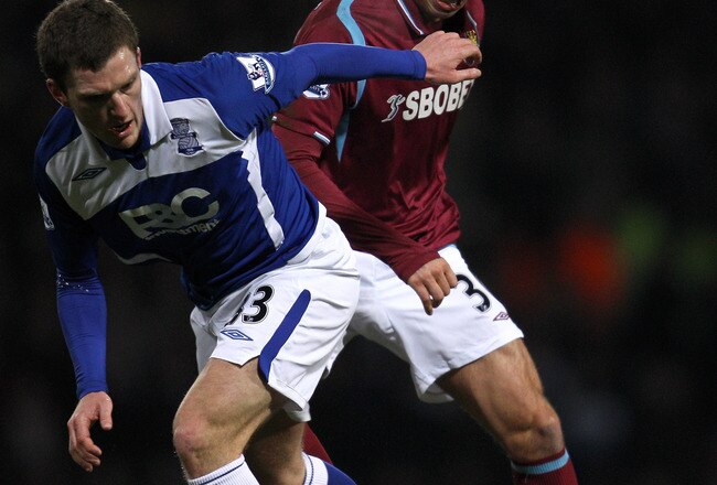 LONDON, ENGLAND - FEBRUARY 10:  Craig Gardener of Birmingham City battles for the ball with James Tomkins of West Ham United during the Barclays Premier League match between West Ham United and Birmingham City at Boleyn Ground on February 10, 2010 in London, England.  (Photo by Paul Gilham/Getty Images)