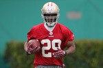 SANTA CLARA, CA - MAY 01:  Glen Coffee #29 of the San Francisco 49ers runs with the ball during the 49ers Minicamp at their training facilities on May 1, 2009 in Santa Clara, California.  (Photo by Jed Jacobsohn/Getty Images)