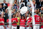 LONDON, ENGLAND - AUGUST 08: Javier Hernandez  of Manchester United lifts the trophy and celebrates with team mates after victory in the FA Community Shield match between Chelsea and Manchester United at Wembley Stadium on August 8, 2010 in London, England.  (Photo by Laurence Griffiths/Getty Images)