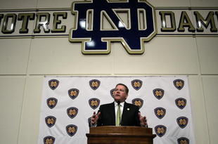 SOUTH BEND, IN - DECEMBER 11: Brian Kelly attends a press conference where he was named new football head coach at Notre Dame University on December 11, 2009 in South Bend, Indiana.  Kelly most recently led the University of Cincinnati to two consecutive Bowl Championship Series appearances including a perfect 12-0 record this past season. (Photo by Frank Polich/Getty Images)