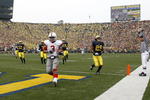 ANN ARBOR, MI - NOVEMBER 21: Brandon Saine #3 of the Ohio State Buckeyes gets in for a second quarter touchdown in front of Troy Woolfolk #29 of the Michigan Wolverines on November 21, 2009 at Michigan Stadium in Ann Arbor, Michigan.  (Photo by Gregory Shamus/Getty Images)