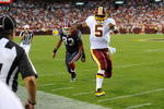 LANDOVER, MD - AUGUST 13:  Donovan McNabb #5 of the Washington Redskins runs out of bounds for a first down during the preseason game against the Buffalo Bills at FedEx Field on August 13, 2010 in Landover, Maryland.  (Photo by Greg Fiume/Getty Images)