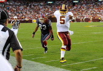 LANDOVER, MD - AUGUST 13:  Donovan McNabb #5 of the Washington Redskins runs out of bounds for a first down during the preseason game against the Buffalo Bills at FedEx Field on August 13, 2010 in Landover, Maryland.  (Photo by Greg Fiume/Getty Images)