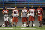 FLAGSTAFF, AZ - AUGUST 02:  (L-R) Larry Fitzgerald #11, Alan Faneca #66, Deuce Lutui #76, Levi Brown #75 and Dan Williams #93 of the Arizona Cardinals practice in the team training camp at Northern Arizona University Walkup Skydome on August 2, 2010 in Flagstaff, Arizona.  (Photo by Christian Petersen/Getty Images)