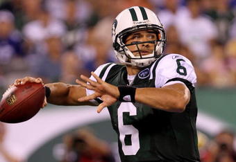 EAST RUTHERFORD, NJ - AUGUST 16:  Quarterback Mark Sanchez #6 of the New York Jets passes against the New York Giants during their game at New Meadowlands Stadium on August 16, 2010 in East Rutherford, New Jersey.  (Photo by Nick Laham/Getty Images)