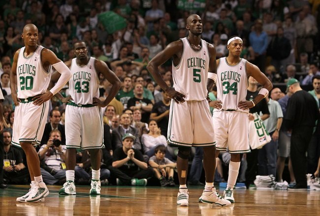 BOSTON - MAY 24:  (L-R) Ray Allen #20, Kendrick Perkins #43, Kevin Garnett #5 and Paul Pierce #34 of the Boston Celtics looks on against the Orlando Magic in Game Four of the Eastern Conference Finals during the 2010 NBA Playoffs at TD Banknorth Garden on May 24, 2010 in Boston, Massachusetts.  NOTE TO USER: User expressly acknowledges and agrees that, by downloading and/or using this Photograph, user is consenting to the terms and conditions of the Getty Images License Agreement.  (Photo by Jim Rogash/Getty Images)