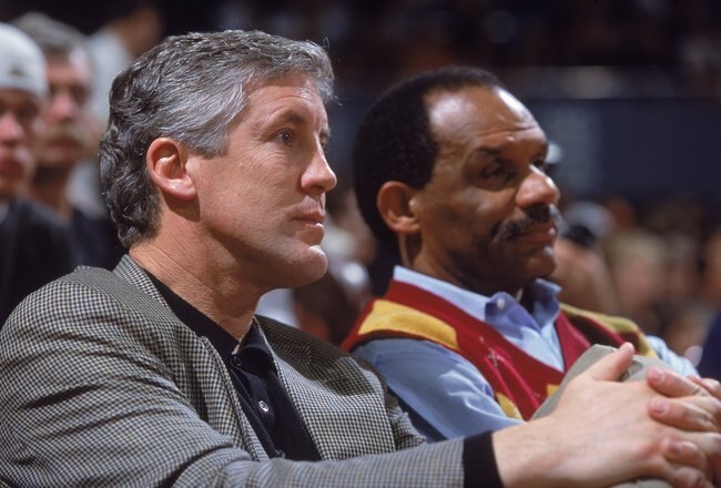 17 Feb 2001:  Head Football Coach Pete Carroll of USC Trojans sits with Athletic Director Mike Garrett during the game between Arizona Wildcats and USC Trojans at the Los Angeles Sports Arena in Los Angeles, California. The Wildcats defeated the Tojans 105-61.Mandatory Credit: Stephen Dunn  /Allsport