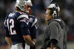 FOXBORO, MA - NOVEMBER 22:  Tom Brady #12 of the New England Patriots talks with head coach Bill Belichick in fourth quarter against the New York Jets on November 22, 2009 at Gillette Stadium in Foxboro, Massachusetts. The Patriots defeated the Jets 31-14.  (Photo by Elsa/Getty Images)