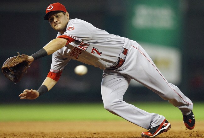 HOUSTON - JULY 24:  Third baseman Paul Janish #7 of the Cincinnati Reds comes up short on ball hit down the line against the Houston Astros at Minute Maid Park on July 24, 2010 in Houston, Texas.  (Photo by Bob Levey/Getty Images)