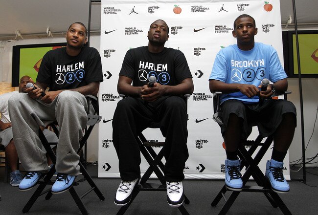 NEW YORK CITY, NY - AUGUST 13: (L-R) Carmelo Anthony, Dwyane Wade and Chris Paul of USAB are interviewed during the World Basketball Festival at Rucker Park on August 13, 2010 in New York City.  (Photo by Chris Trotman/Getty Images for Nike)