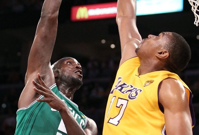 LOS ANGELES, CA - JUNE 17:  Kevin Garnett #5 of the Boston Celtics shoots the ball over Andrew Bynum #17 of the Los Angeles Lakers in Game Seven of the 2010 NBA Finals at Staples Center on June 17, 2010 in Los Angeles, California.  NOTE TO USER: User expressly acknowledges and agrees that, by downloading and/or using this Photograph, user is consenting to the terms and conditions of the Getty Images License Agreement.  (Photo by Christian Petersen/Getty Images)