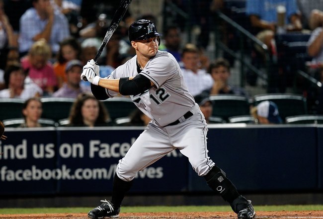 ATLANTA - JULY 02:  Cody Ross #12 of the Florida Marlins against the Atlanta Braves at Turner Field on July 2, 2010 in Atlanta, Georgia.  (Photo by Kevin C. Cox/Getty Images)