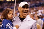 INDIANAPOLIS - JANUARY 16:  Former Indianapolis Colts head coach Tony Dungy and his child on the sideline before the Colts take on the Baltimore Ravens in the AFC Divisional Playoff Game at Lucas Oli Stadium on January 16, 2010 in Indianapolis, Indiana.  (Photo by Andy Lyons/Getty Images)