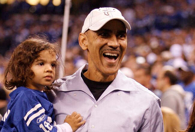 INDIANAPOLIS - JANUARY 16:  Former Indianapolis Colts head coach Tony Dungy and his child on the sideline before the Colts take on the Baltimore Ravens in the AFC Divisional Playoff Game at Lucas Oli Stadium on January 16, 2010 in Indianapolis, Indiana.  (Photo by Andy Lyons/Getty Images)