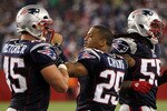 FOXBORO, MA - AUGUST 12: Patrick Chung # 25 greets Dane Fletcher # 45 and Brandon Spikes # 55 of the New England Patriots during the second half of a preseason game against the New Orleans Saints at Gillette Stadium on August 12, 2010 in Foxboro, Massachusetts. (Photo by Jim Rogash/Getty Images)