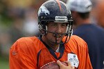 ENGLEWOOD, CO - AUGUST 05:  Quarterback Kyle Orton #8 of the Denver Bronocs takes part in practice during training camp at Dove Valley on August 5, 2010 in Englewood, Colorado.  (Photo by Doug Pensinger/Getty Images)