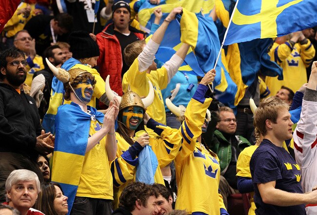 VANCOUVER, BC - FEBRUARY 21:  Fans in support of Sweden support their team against Finland during the ice hockey men's preliminary game between Sweden and Finland on day 10 of the Vancouver 2010 Winter Olympics at Canada Hockey Place on February 21, 2010 in Vancouver, Canada.  (Photo by Bruce Bennett/Getty Images)