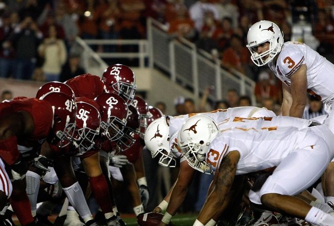 PASADENA, CA - JANUARY 07:  Quarterback Garrett Gilbert #3 of the Texas Longhorns under center against the Alabama Crimson Tide during the Citi BCS National Championship game at the Rose Bowl on January 7, 2010 in Pasadena, California.  (Photo by Jeff Gross/Getty Images)
