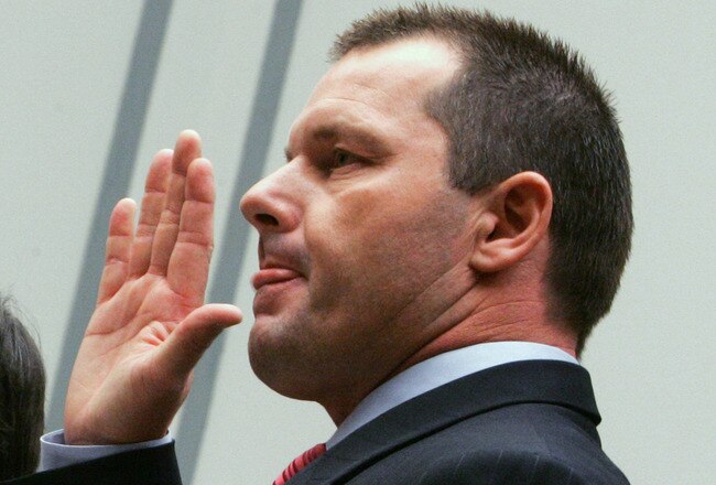 WASHINGTON - FEBRUARY 13:  Major League Baseball player Roger Clemens raises his right hand as he is sworn in during a House Oversight and Government Reform Committee, February 13, 2008 in Washington, DC. The committee is hearing testimony on the use the Illegal Use of Steroids and Other Performance Enhancing Substances by Players in Major the Illegal use of steroids and other performance enhancing substances by players in Major League Baseball.  (Photo by Mark Wilson/Getty Images)