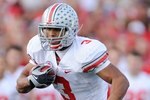 PASADENA, CA - JANUARY 01:  Running back Brandon Saine #3 of the Ohio State Buckeyes runs with the ball against the Oregon Ducks during the 96th Rose Bowl game on January 1, 2010 in Pasadena, California.  (Photo by Kevork Djansezian/Getty Images)