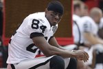 KANSAS CITY, MO - SEPTEMBER 20:  Javon Walker #84 of the Oakland Raiders looks on during the game against the Kansas City Chiefs at Arrowhead Stadium on September 20, 2009 in Kansas City, Missouri. (Photo by Jamie Squire/Getty Images)