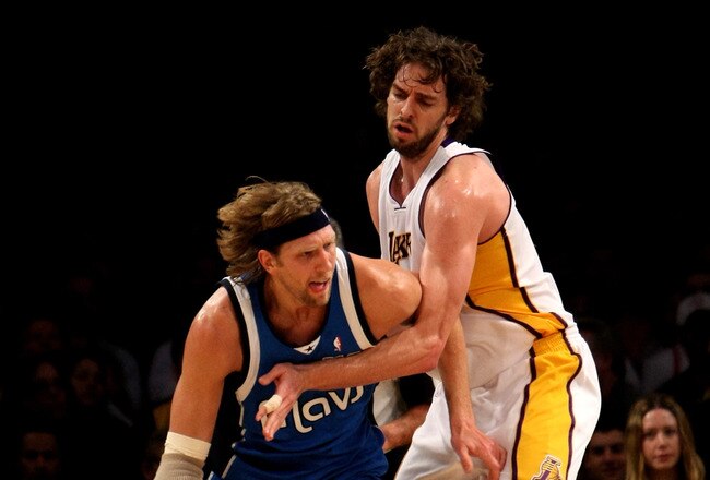 LOS ANGELES, CA - JANUARY 03: Dirk Nowitzki #41 of the Dallas Mavericks driveas against Pau Gasol #16 of the Los Angeles Lakers on January 3, 2010 at Staples Center in Los Angeles, California. NOTE TO USER: User expressly acknowledges and agrees that, by downloading and/or using this Photograph, user is consenting to the terms and conditions of the Getty Images License Agreement. (Photo by Stephen Dunn/Getty Images)