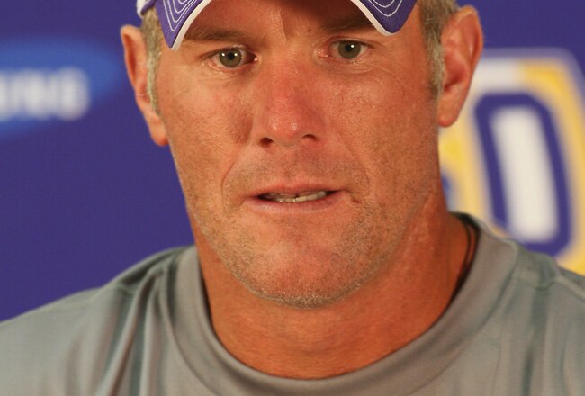 EDEN PRAIRIE, MN - AUGUST 18: Minnesota Vikings quarterback Brett Favre addresses the media at a press conference after the first morning practice since returning to Vikings Winter Park on August 18, 2010 in Eden Prairie, Minnesota. Favre injured his ankle last year and had been reportedly considering retiring after one season with the Vikings.  (Photo by Adam Bettcher/Getty Images)