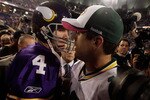 MINNEAPOLIS - OCTOBER 05:  Quarterback Brett Favre #4 of the Minnesota Vikings hugs Aaron Rodgers #12 of the Green Bay Packers following the Vikings victory over the Packers on October 5, 2009 at Hubert H. Humphrey Metrodome in Minneapolis, Minnesota.  (Photo by Jamie Squire/Getty Images)