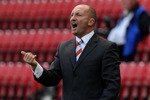 WIGAN, ENGLAND - AUGUST 14:  Blackpool Manager Ian Holloway gestures during the Barclays Premier League match between Wigan Athletic and Blackpool at the DW Stadium on August 14, 2010 in Wigan, England.  (Photo by Alex Livesey/Getty Images)