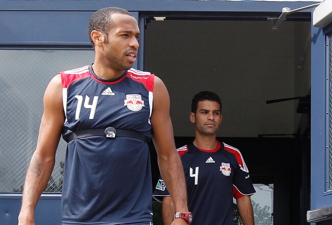 MONTCLAIR, NJ - AUGUST 03:  Rafa Marquez #4 and Thierry Henry #14 of the New York Red Bulls arrive for practice at Montclair State University on August 3, 2010 in Montclair, New Jersey.  (Photo by Mike Stobe/Getty Images for New York Red Bulls)