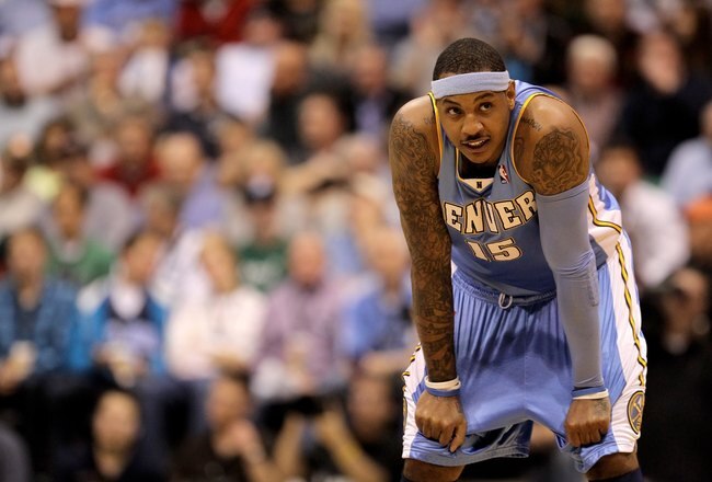 SALT LAKE CITY - APRIL 30:  Carmelo Anthony #15 of the Denver Nuggets stands on the court during their game against the Utah Jazz in Game Six of the Western Conference Quarterfinals of the 2010 NBA Playoffs at EnergySolutions Arena on April 30, 2010 in Salt Lake City, Utah. NOTE TO USER: User expressly acknowledges and agrees that, by downloading and or using this photograph, User is consenting to the terms and conditions of the Getty Images License Agreement.  (Photo by Ezra Shaw/Getty Images)