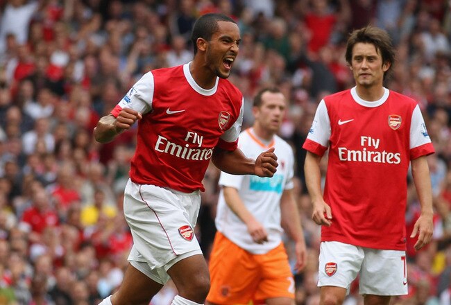 LONDON, ENGLAND - AUGUST 21:  Theo Walcott of Arsenal celebrates his third goal during the Barclays Premier League match between Arsenal and Blackpool at The Emirates Stadium on August 21, 2010 in London, England.  (Photo by Clive Rose/Getty Images)