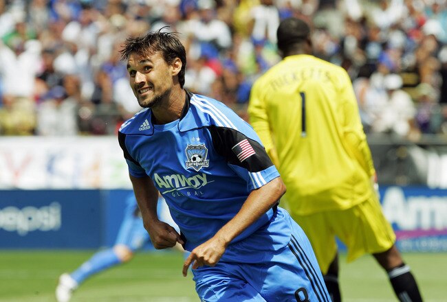 SANTA CLARA, CA - AUGUST 21:  Chris Wondolowski #8 of the San Jose Earthquakes smiles after scoring against goalie Donovan Ricketts #1 of the Los Angeles Galaxy in the first half on August 21, 2010 at Buck Shaw Stadium in Santa Clara, California.  (Photo by Brian Bahr/Getty Images)
