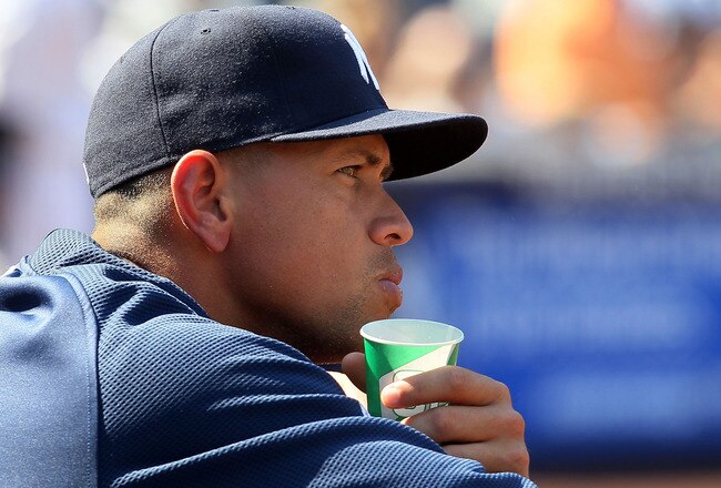 NEW YORK - AUGUST 19:  Alex Rodriguez #13 of the New York Yankees looks on from the dugout against the Detroit Tigers on August 19, 2010 at Yankee Stadium in the Bronx borough of New York City.  (Photo by Jim McIsaac/Getty Images)