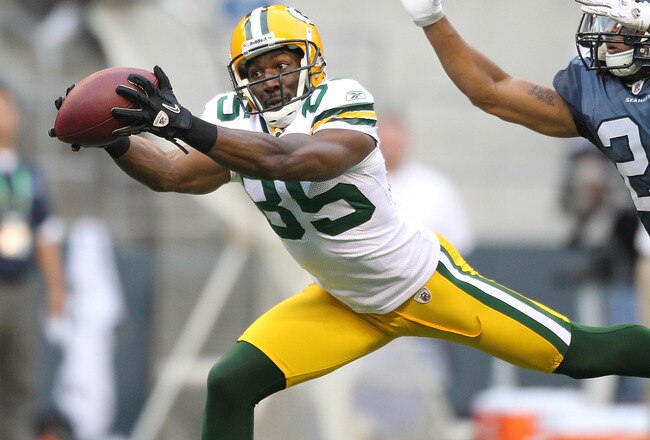 SEATTLE - AUGUST 21:  Wide receiver Greg Jennings #85 of the Green Bay Packers makes a catch during the preseason game against Earl Thomas #29 of the Seattle Seahawks at Qwest Field on August 21, 2010 in Seattle, Washington. (Photo by Otto Greule Jr/Getty Images)