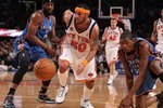 NEW YORK - FEBRUARY 20:  Eddie House #50 of the New York Knicks scrambles after the ball surrounded by James Harden #13 and Kevin Durant #35 of the Oklahoma City Thunder at Madison Square Garden on February 20, 2010 in New York, New York. NOTE TO USER: User expressly acknowledges and agrees that, by downloading and or using this photograph, User is consenting to the terms and conditions of the Getty Images License Agreement.  (Photo by Nick Laham/Getty Images)