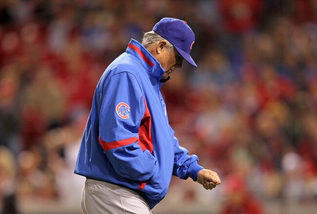 CINCINNATI - MAY 08:  Lou Piniella the manager of the Chicago Cubs walks back to the dug out in the 6th inning during the game against the Cincinnati Reds at Great American Ball Park on May 8, 2010 in Cincinnati, Ohio. The Reds won 14-2.  (Photo by Andy Lyons/Getty Images)