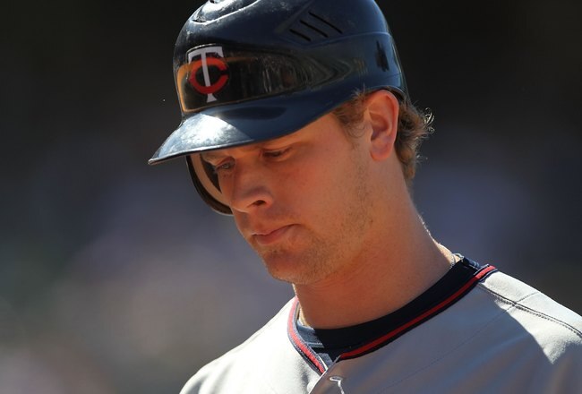 OAKLAND, CA - JUNE 06:  Justin Morneau #33 of the Minnesota Twins bats against the Oakland Athletics during an MLB game at the Oakland-Alameda County Coliseum on June 6, 2010 in Oakland, California.  (Photo by Jed Jacobsohn/Getty Images)