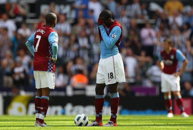 NEWCASTLE UPON TYNE, ENGLAND - AUGUST 22:  Ashley Young and Emile Heskey of Aston Villa look dejected during the Barclays Premier League match between Newcastle United and Aston Villa at St James' Park on August 22, 2010 in Newcastle upon Tyne, England.  (Photo by Alex Livesey/Getty Images)