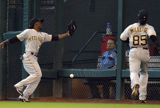 HOUSTON - AUGUST 15:  Center fielder Andrew McCutchen #22 of the Pittsburgh Pirates can not run down this ground rule double off the bat of Hunter Pence of the Houston Astros in the sixth inning at Minute Maid Park on August 15, 2010 in Houston, Texas.  (Photo by Bob Levey/Getty Images)