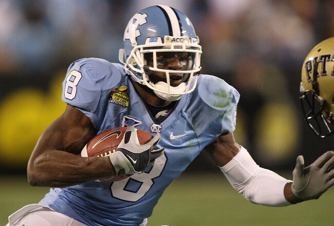 CHARLOTTE, NC - DECEMBER 26:  Aaron Berry #17 of the Pittsburgh Panthers tackles Greg Little #8 of the North Carolina Tar Heels during their game on December 26, 2009 in Charlotte, North Carolina.  (Photo by Streeter Lecka/Getty Images)