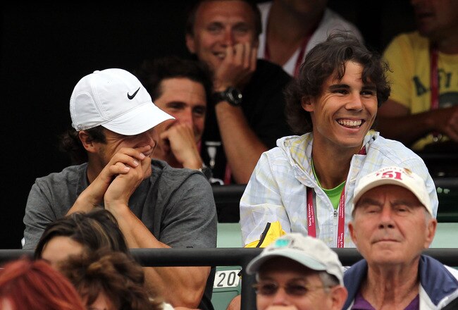 KEY BISCAYNE, FL - MARCH 29:  Rafael Nadal of Spain watches as Roger Federer of Switzerland plays against Florent Serra of France on day seven of the 2010 Sony Ericsson Open at Crandon Park Tennis Center on March 29, 2010 in Key Biscayne, Florida.  (Photo by Al Bello/Getty Images)