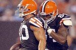 CLEVELAND - AUGUST 21:  Peyton Hillis #40 of the Cleveland Browns celebrates with Robert Royal #84 after a run against the St. Louis Rams at Cleveland Browns Stadium on August 21, 2010 in Cleveland, Ohio.  (Photo by Matt Sullivan/Getty Images)