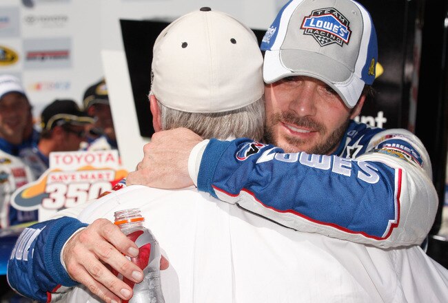SONOMA, CA - JUNE 20:  Jimmie Johnson, driver of the #48 Lowe's Chevrolet, celebrates in the winners circle with team owner Rick Hendrick after winning the NASCAR Sprint Cup Series Toyota/Save Mart 350 at Infineon Raceway on June 20, 2010 in Sonoma, California.  (Photo by Chris Graythen/Getty Images for NASCAR)