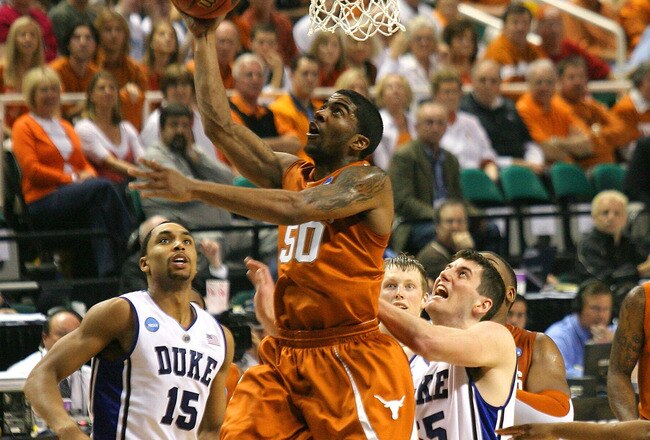 GREENSBORO, NC - MARCH 21:  Varez Ward #50 of the Texas Longhorns lays in a basket against Brian Zoubek #55 of the Duke Blue Devils during the second round of the NCAA Division I Men's Basketball Tournament at the Greensboro Coliseum on March 21, 2009 in Greensboro, North Carolina.  (Photo by Streeter Lecka/Getty Images)