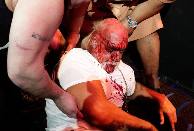 SYDNEY, AUSTRALIA - NOVEMBER 18:  Hulk Hogan is helped by the 'Nasty Boys' Brian Knobbs and Solofa Fatu Jnr after an altercation with Rick Flair during a press conference for 'Hulkamania - Let The Battle Begin' at Star City on November 18, 2009 in Sydney, Australia.  (Photo by Brendon Thorne/Getty Images)
